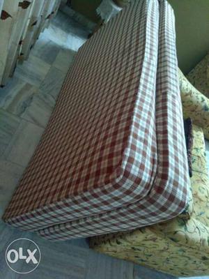 Two Re And White Flannel Mattress - mattress only.