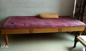 Wooden bed with mattress (gadda)