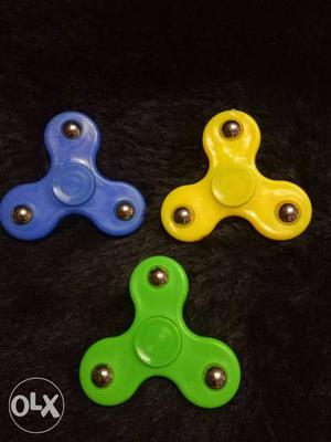 Yellow, Blue, And Green Hand Spinners