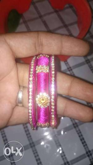 6 Pink colour silk tread bangles with full stone work. Size: