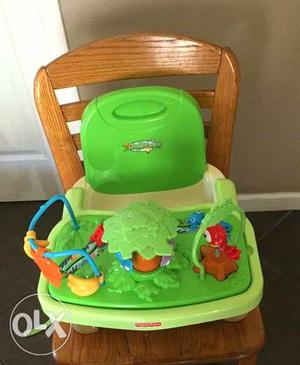Baby's White And Green Fisher-Price Booster Chair