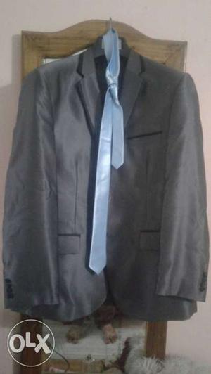 Black Suit Jacket; Blue Silk Necktie