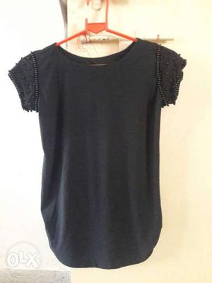 Black colour top actual price is 700 only 1 time