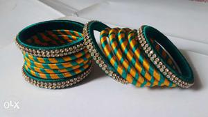 Green & orange silk thread bangles different