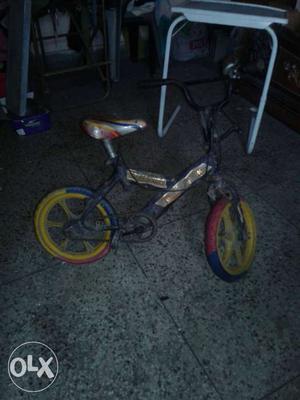 Kid's Blue And Yellow Bicycle