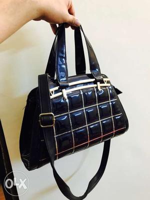 Luxury navy blue handbag up for sale