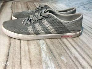 Pair Of Gray-and-white Adidas Low Top Sneakers