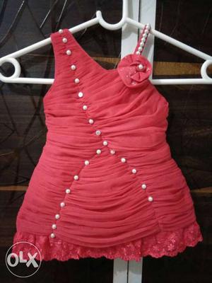 Red color party wear dress (6 months above) in new condition