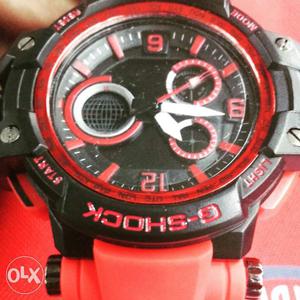 Round Black-and-red Casio G-shock Digital Watch