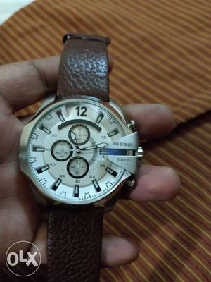 Round Silver Chronograph Wrist Watch With Brown Leather