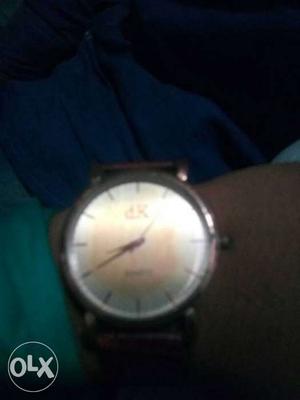Round dial wrist watch available for sale