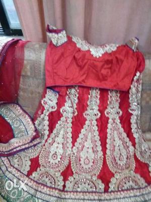 Sequined Red And Gold-colored Floral Gagra Choli