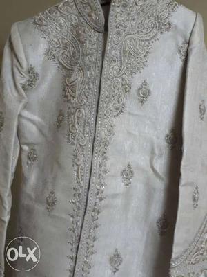 Sherwani used only once. in good condition with