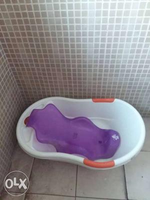 Baby's White And Purple Plastic Bath Tub