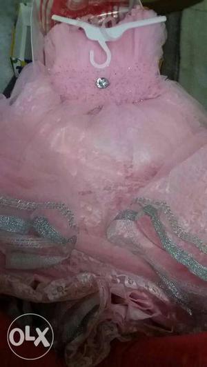 Beautiful design and unused gown for 5 years old girl with