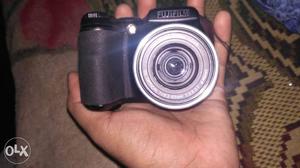 Black Fujifilm DSLR Camera