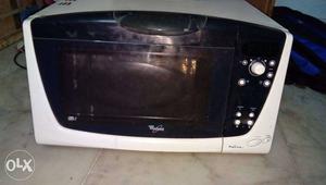 White And Black Whirlpool Microwave Oven