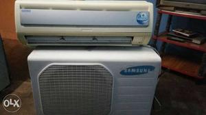 White-and-beige Samsung Split Type And Ac Condenser Units