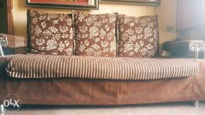 1 year old sofa. chocolate Brown colour. with