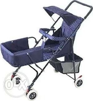 Baby's Purple And White Polka Dot Stroller
