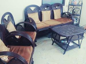 Cane sofa 5 seater with cushions, center table,