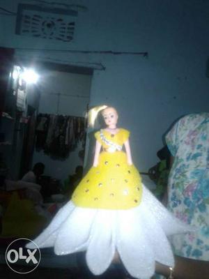 Female Doll Wearing White And Yellow Cap Sleeve Ballgown