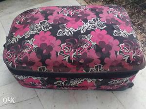 Floral travelling trolley suitcase bought from