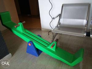 Green And Blue Plastic Seesaw