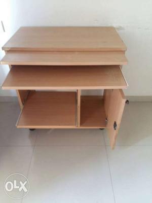I want to sell brown wooden computer table for Rs./-