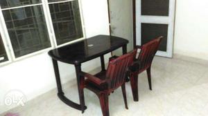 One new plastic table along with 4 chairs bought