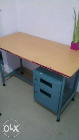 Plywood Table top with iron stands. one year old,