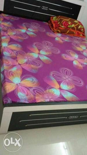 Purple, Blue, And Orange Floral Bedsheet