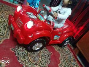 Toddler's Red Ride On Car Brand new without battery pandel