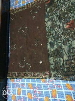 Two Brown And Green Floral Textiles