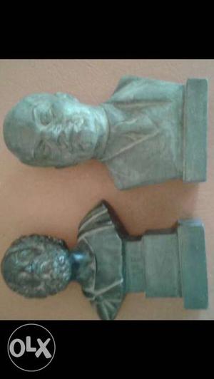 Two Gray Head Bust Statues