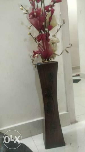 Wooden flower vase with artificial flowers