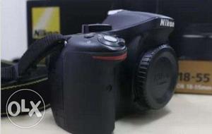 2 year old hardly used Nikon  with 200 mm zoom lens and