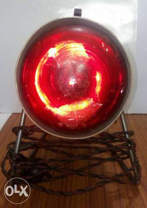 Antique infra light in working condition.