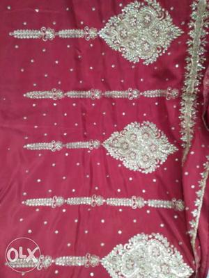 Aari work red sari