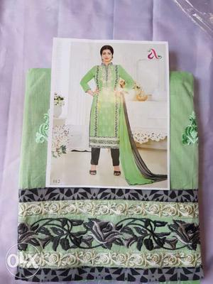 Beautiful green punjabi suit cloth with black and