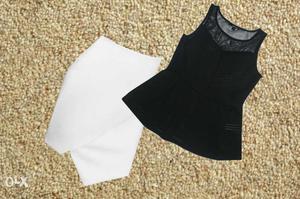 Black Sleveless Knitted Cotton Peplum Top Size: