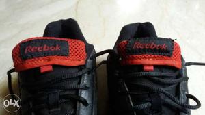Black-and-red Reebok Athletic Shoes