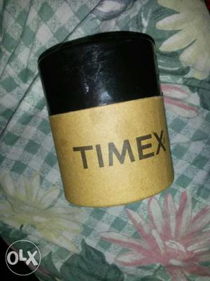Brown And Black Timex Container