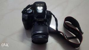 Canon DSLR D450 with 18 to 55mm lens.charger