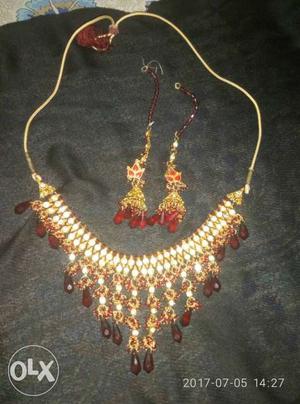Gold Necklace And Pair Of Earrings Jewelry Set