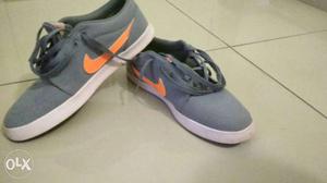 Grey-and-white Nike Low Top Sneakers