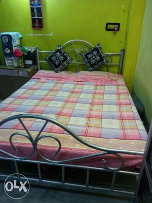 Iron double bed 7/5 with mattress at Rs 