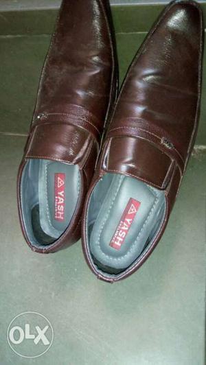 One time used leather Brown color shoes