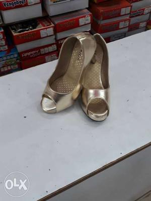 Pair Of Gold-colored Open Toe Heeled Shoes