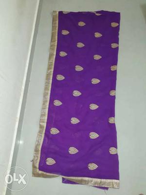 Purple And White Printed Textile